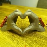 lovehandgebaar met eigen namen.